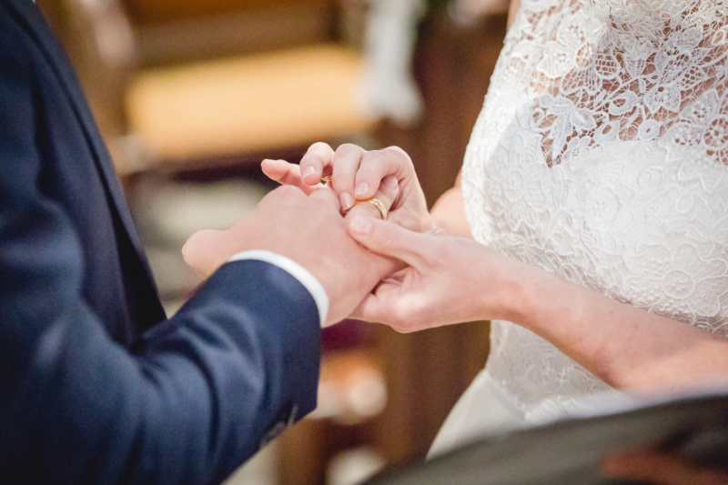 wedding ring exchange by sarahandsamuelphotography